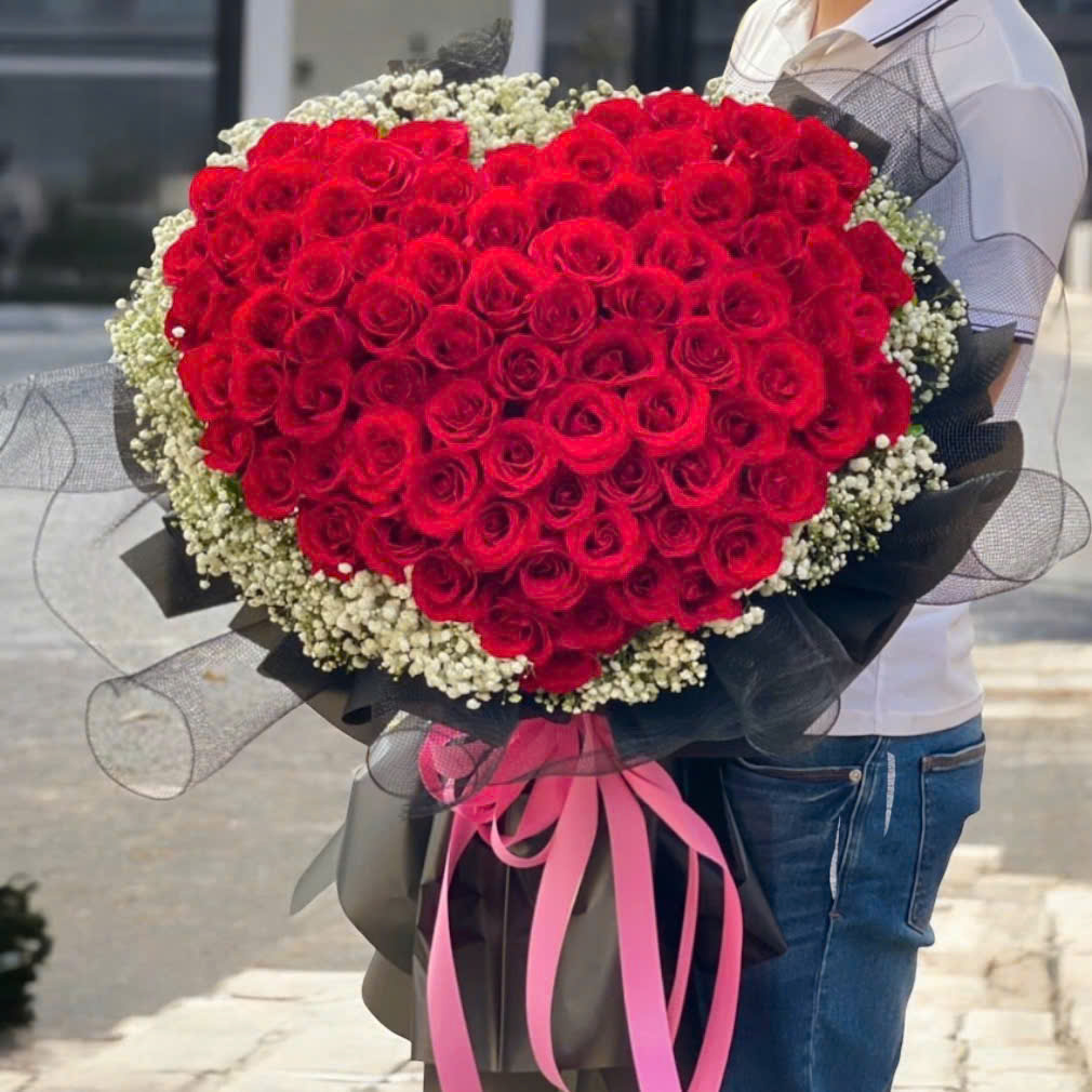 99 red roses heart shape arrangement in hcm city