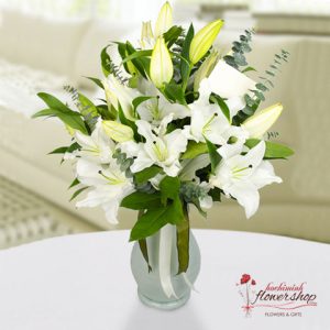 Hochiminh flowers in a vase with white lilies