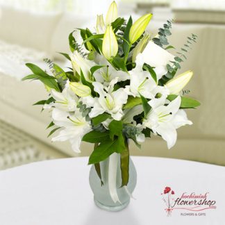 Hochiminh flowers in a vase with white lilies