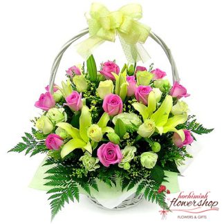 Basket of pink roses and yellow lilies
