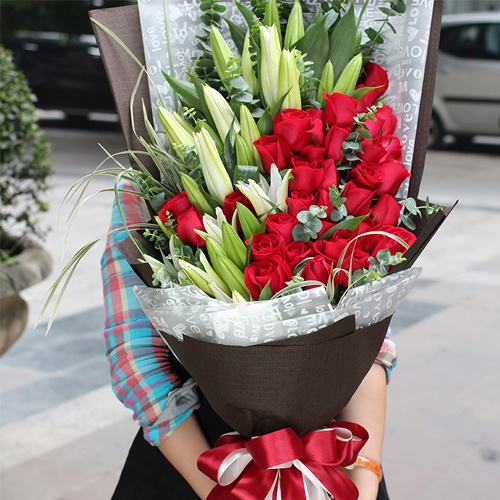 bouquet of lilies and red rose