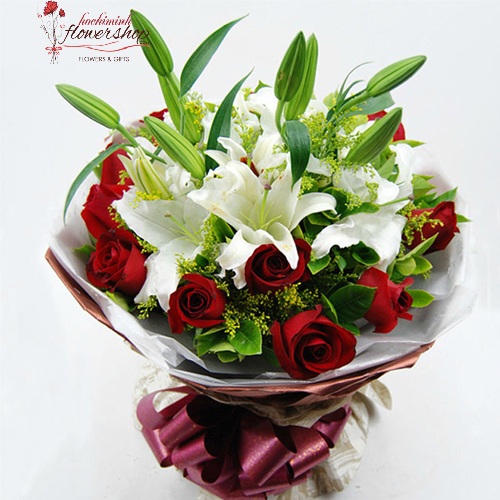 white lilies and red rose bouquet