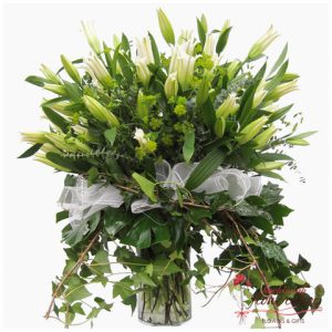 White lilies in a vase delivery hochiminh