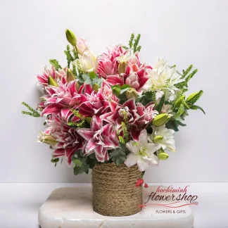Pink and white lily flower basket in Ho Chi Minh City